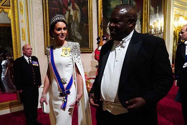 Kate Middleton walks with guest at State Banquet
