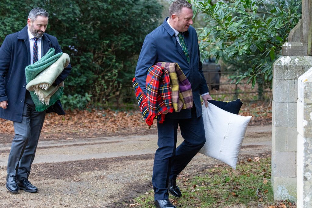 Cushions and rugs being taken into the church for King Charles and Queen Camilla