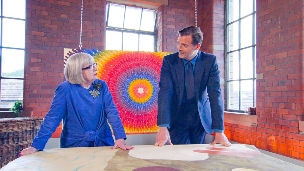 Esme Young and Patrick Grant in front of painting on The Great British Sewing Bee