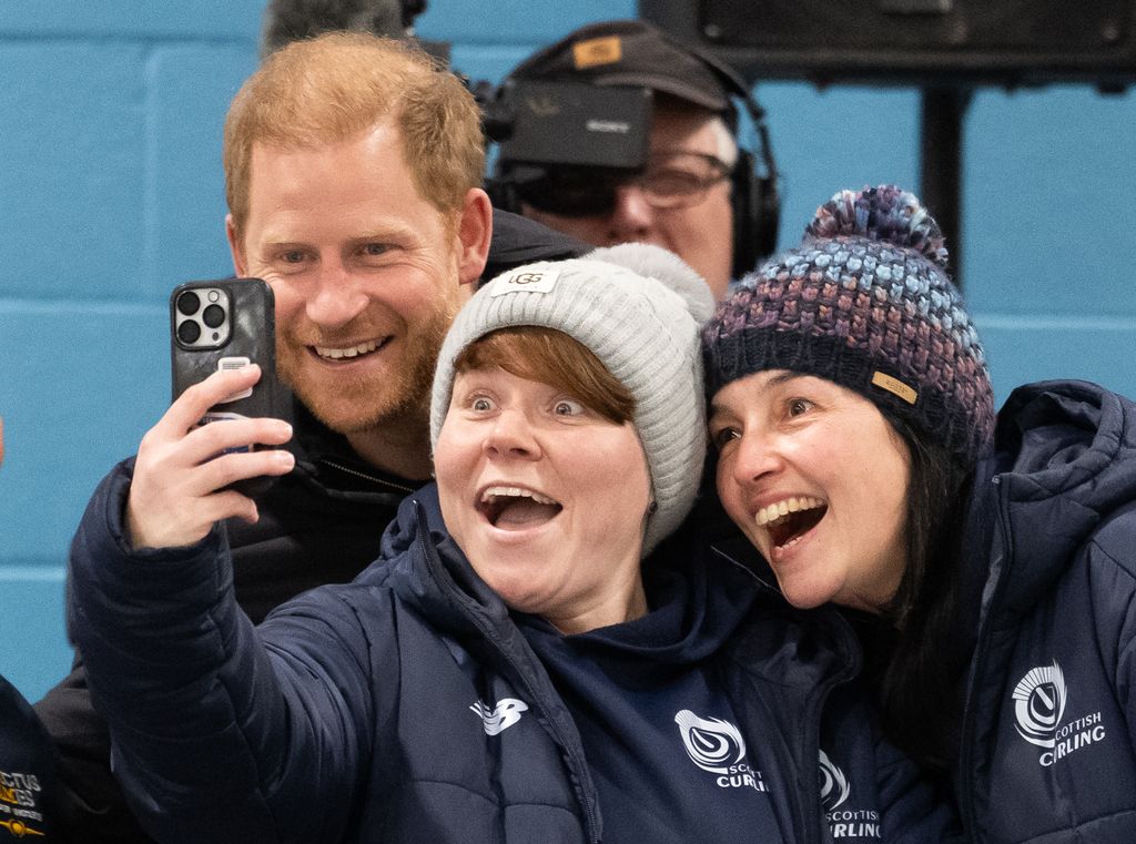 Prince Harry, Duke of Sussex poses for a photo as he attends the Wheelchair Curling at Hillcrest Recreation Centre
