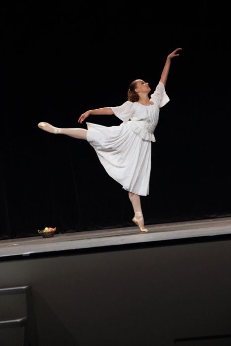 Ballet dancer in long white dress