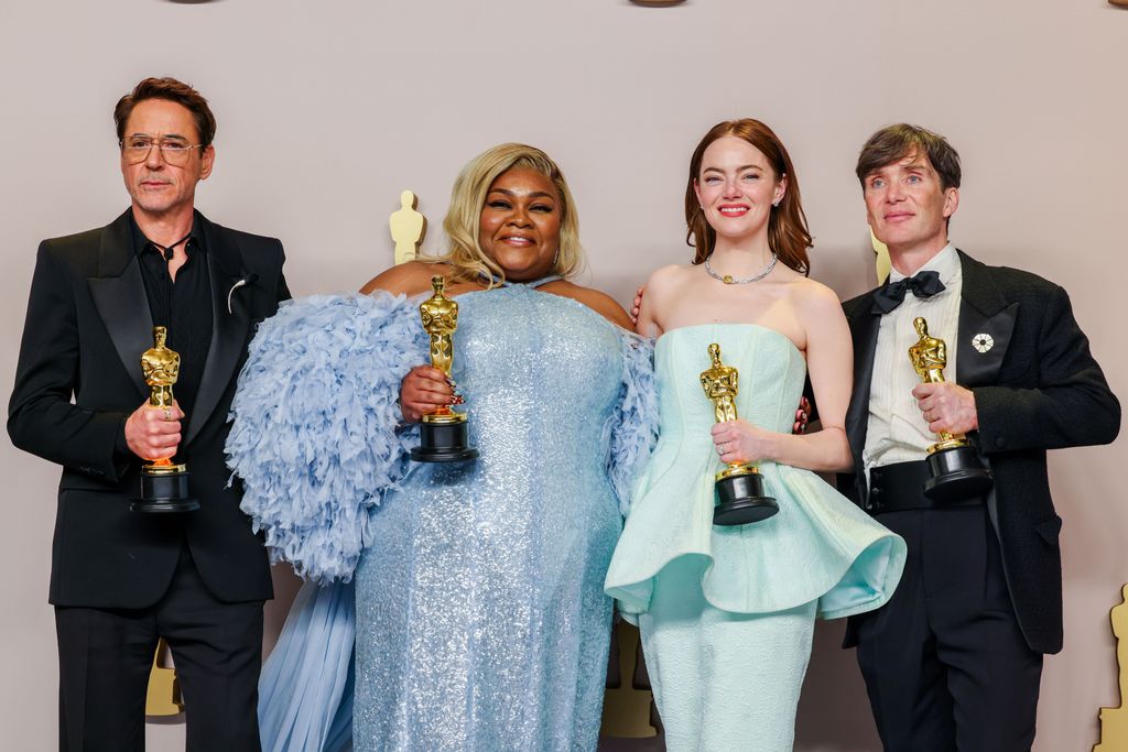 Robert Downey Jr., Da'Vine Joy Randolph, Emma Stone and Cillian Murphy in the deadline room at the 96th Annual Academy Awards 