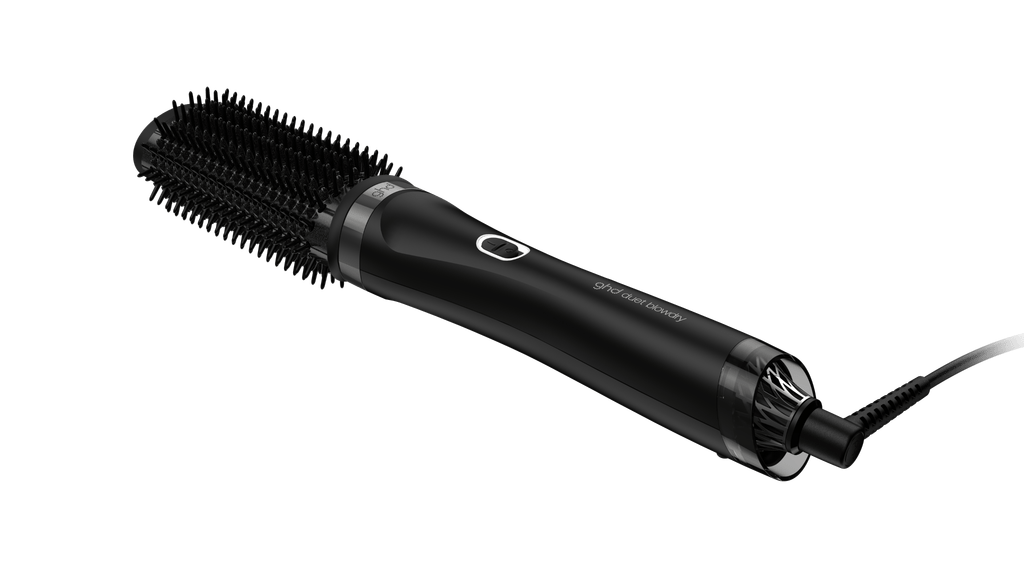 ghd's Duet Blowdry brush on a black background 