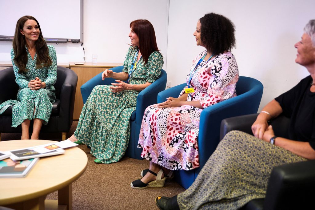 Kate Middleton speaking with health visitors about the trial