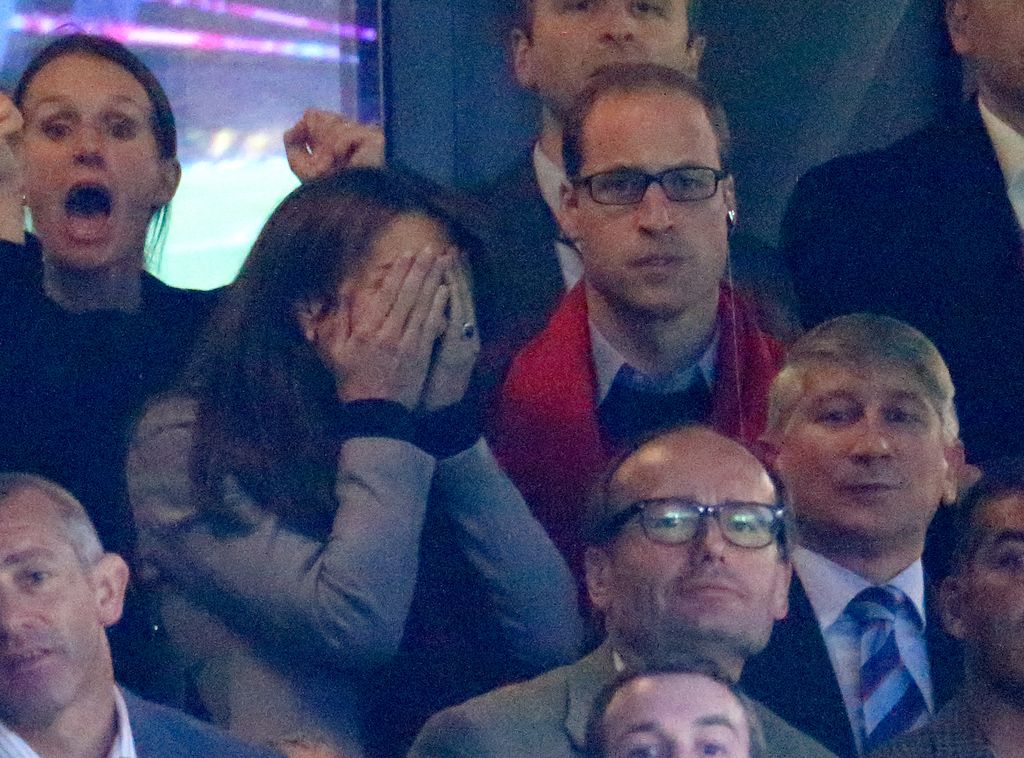 Princess Kate head in hands rugby