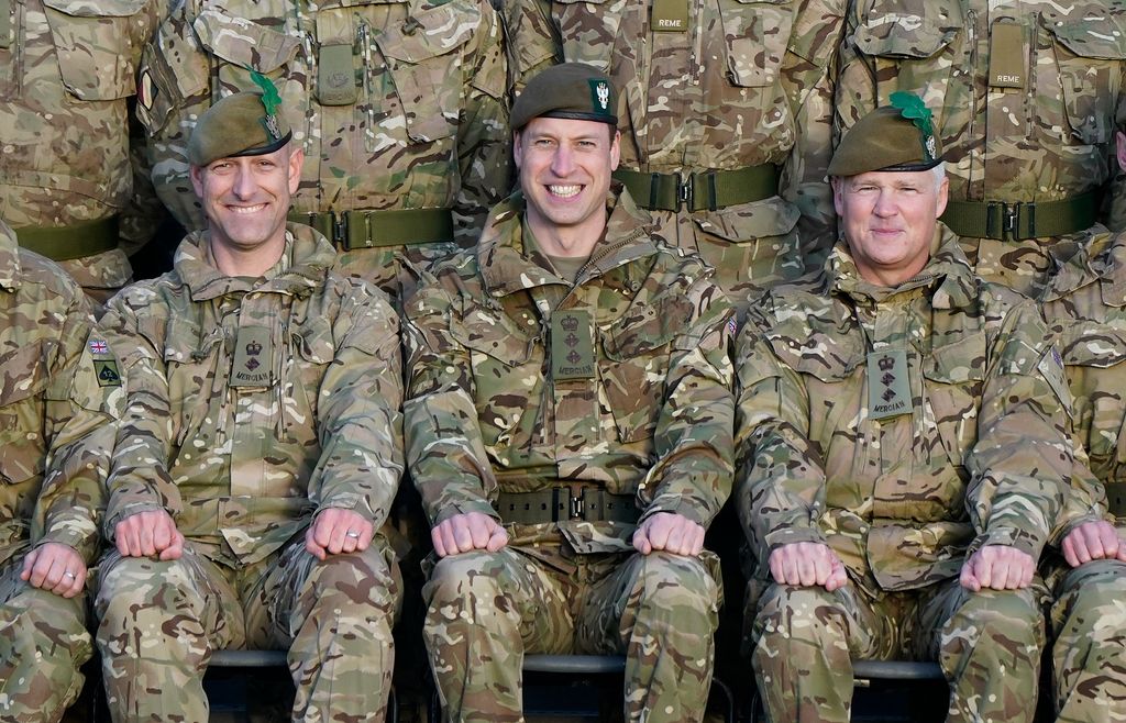 Prince William with army men