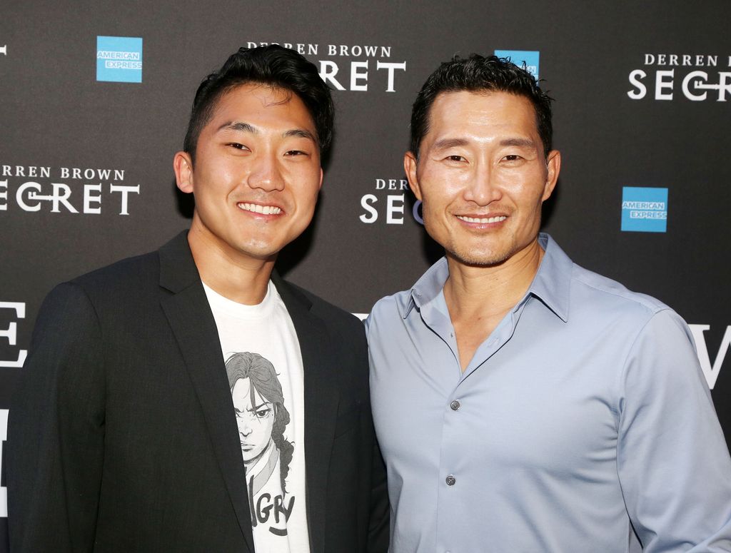 Zander Kim and father Daniel Dae Kim pose at the opening night of "Derren Brown: Secret" in 2019