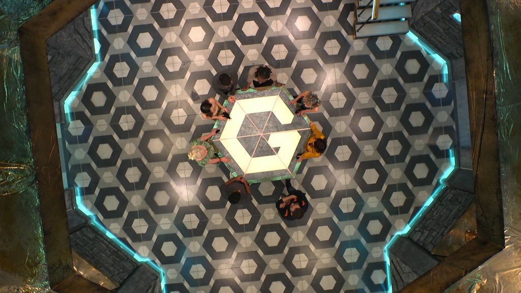 game show contestants standing in circle
