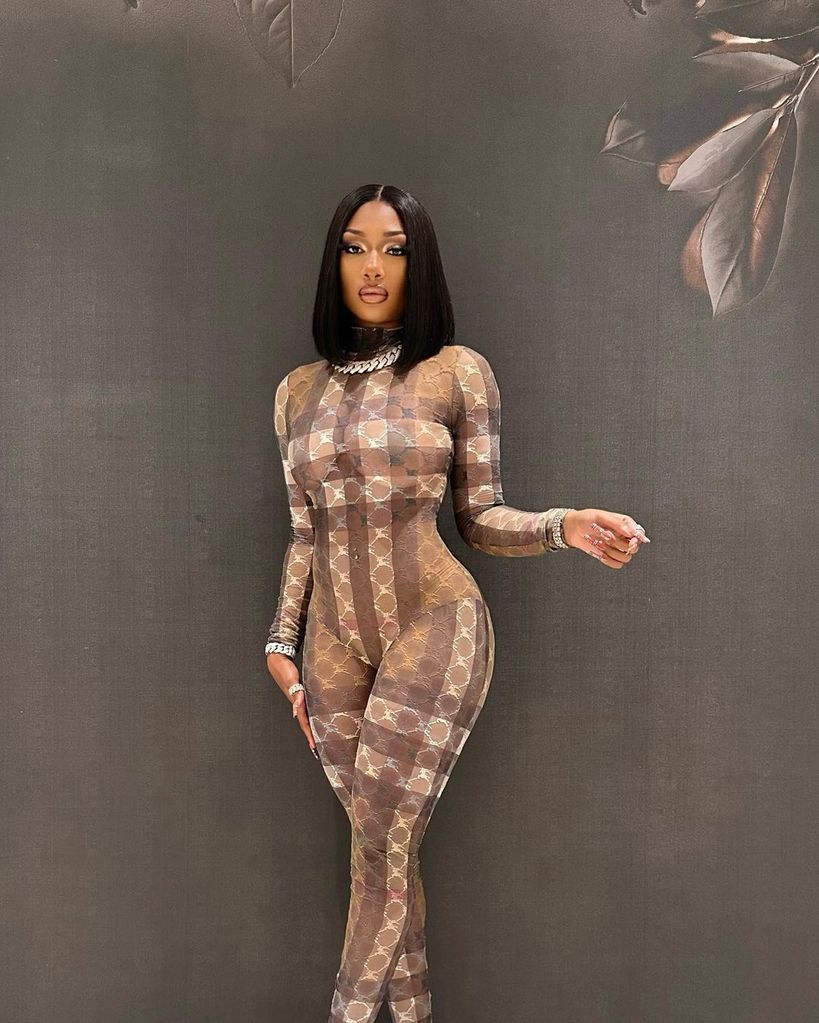 Megan Thee Stallion wearing sheer catsuit and shoulder length hair