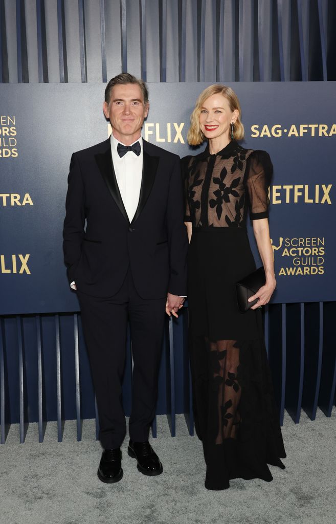 Billy Crudup and Naomi Watts in matching black outfits