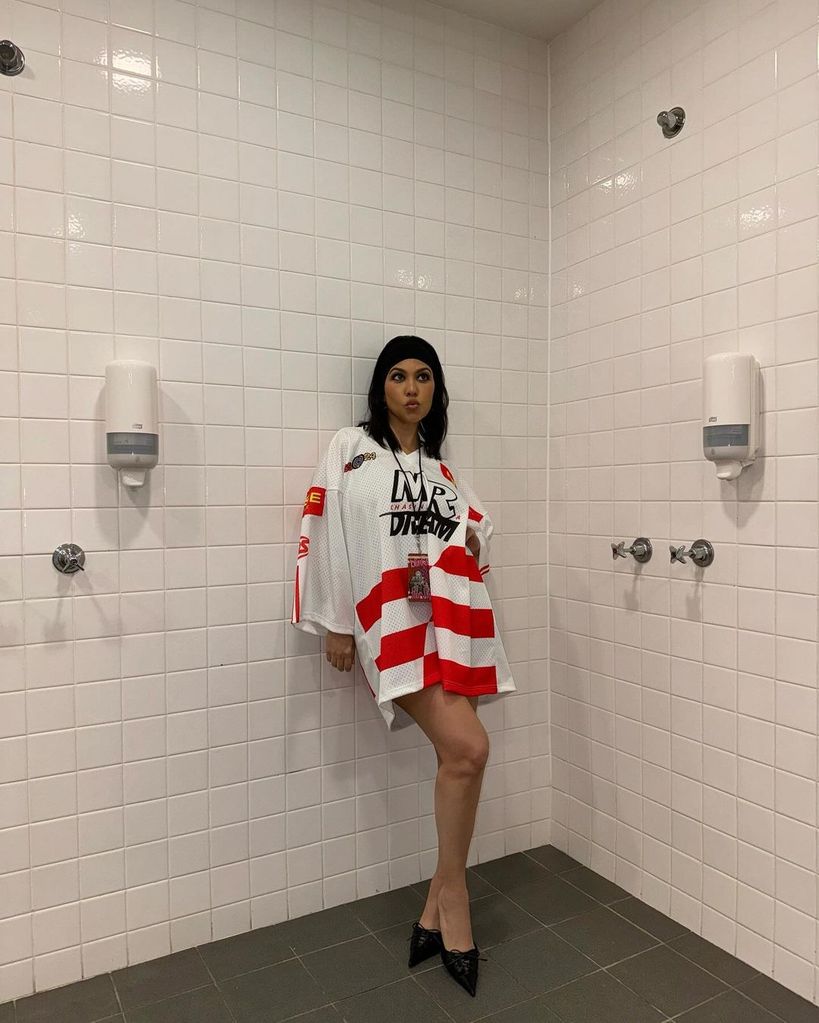 kourtney kardashian posing in bathroom