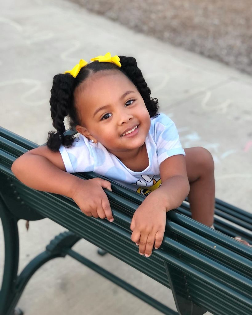 photo of cade cunningham daughter riley with yellow bow in her hair