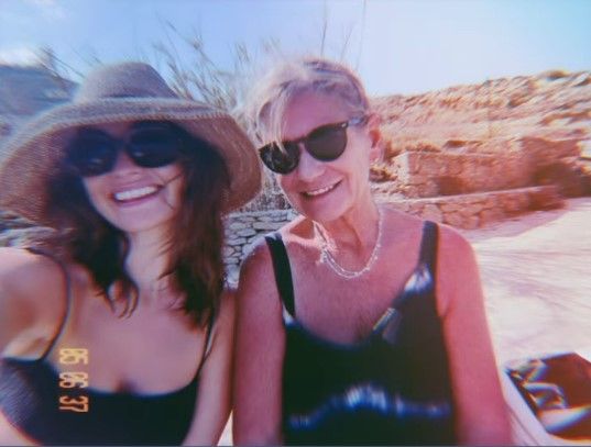 Lily posed for a sweet beach snap with her lookalike mum