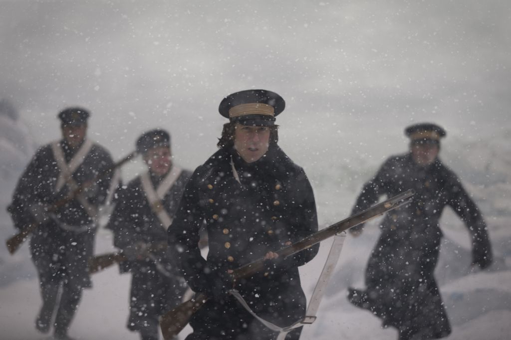 sailors in snow holding guns
