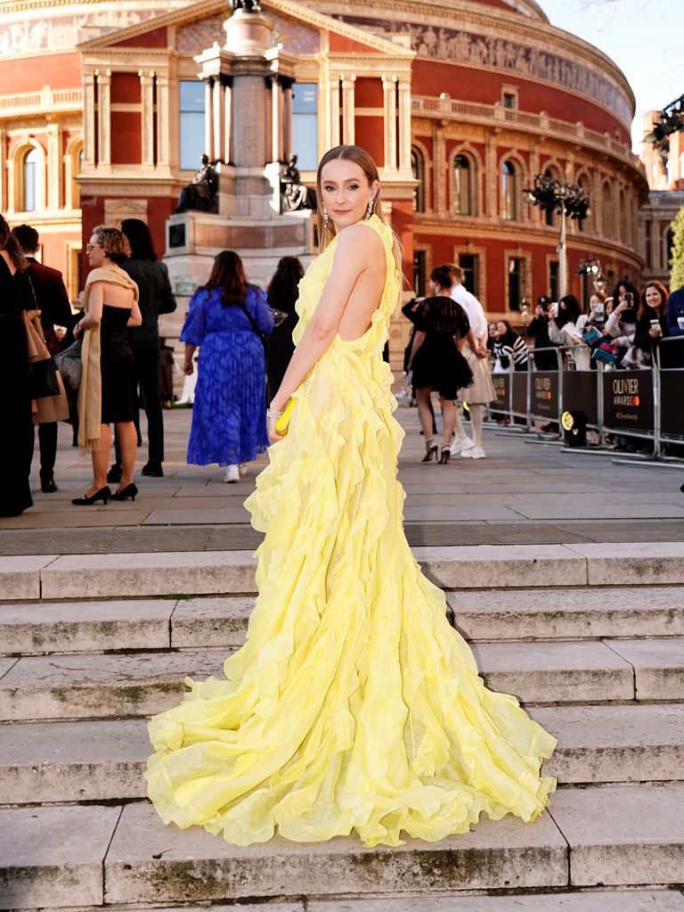 Rose showcasing her gown's incredible train