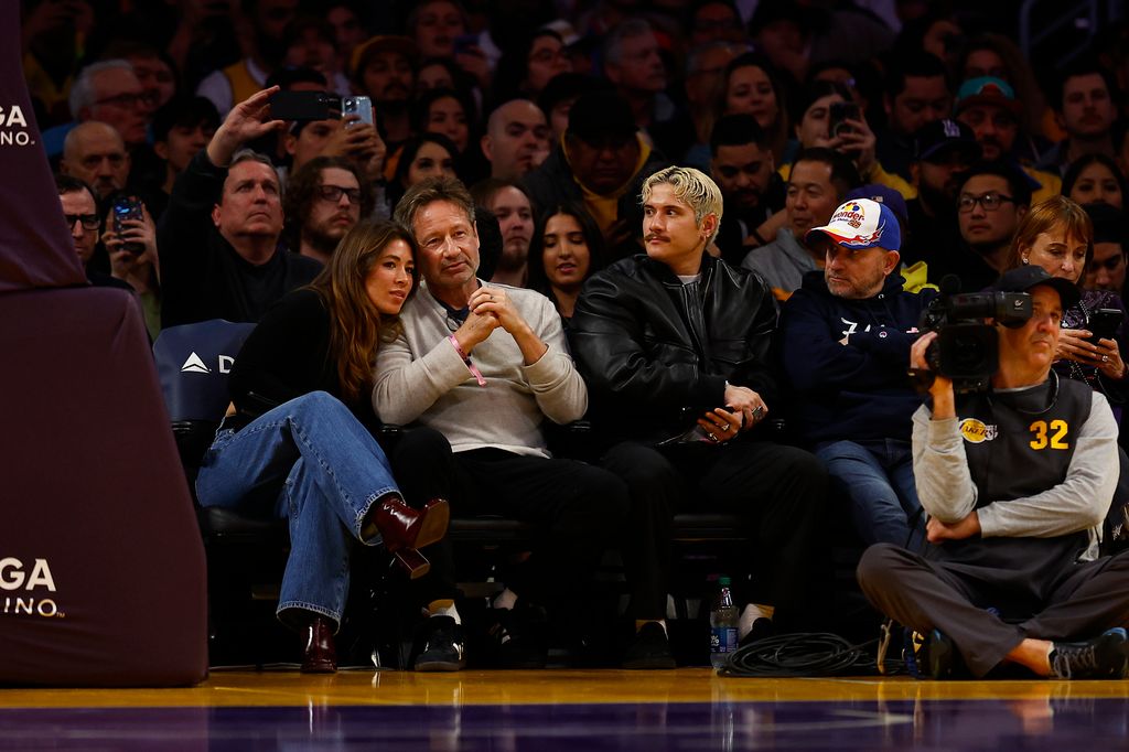 Monique Pendleberry and David Duchovny attend a game between the Oklahoma City Thunder and the Los Angeles Lakers in the first half at Crypto.com Arena on January 15, 2024