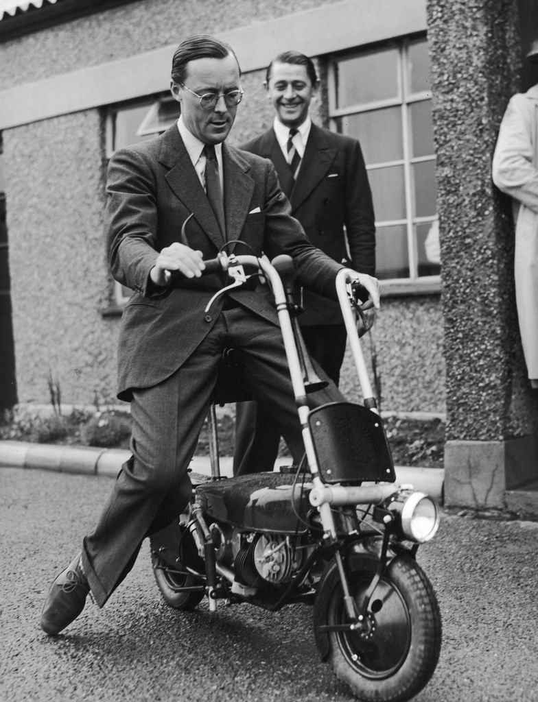 Prince Bernhard riding on a scooter