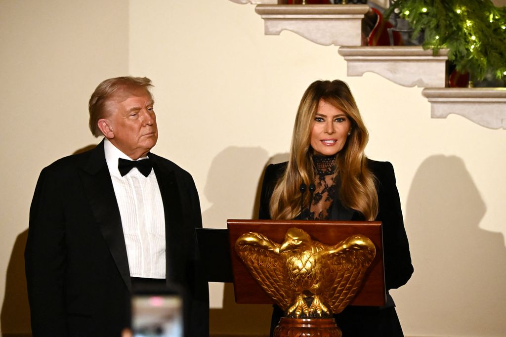 US First Lady Melania Trump, accompanied by President Donald Trump, delivers remarks during the Congressional Ball in 2025