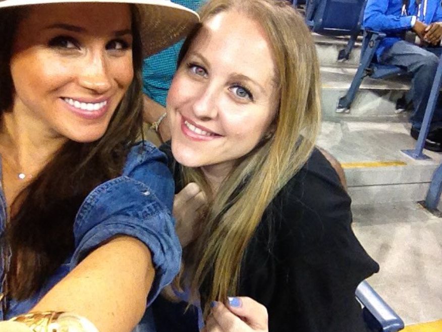 Meghan Markle and Lindsay Roth at a sports game