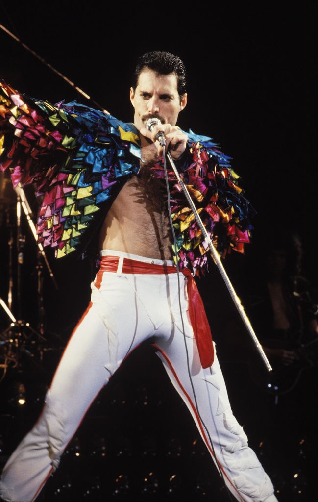 Gay icon and Queen frontman Freddie Mercury wears a rainbow feathered jacket during the band's 1982 tour 