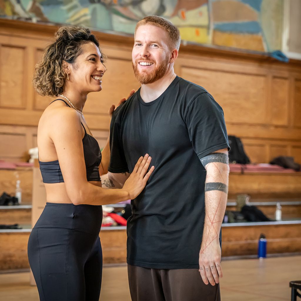 Karen Hauer places a hand on Neil Jones' stomach during Strictly rehearsals