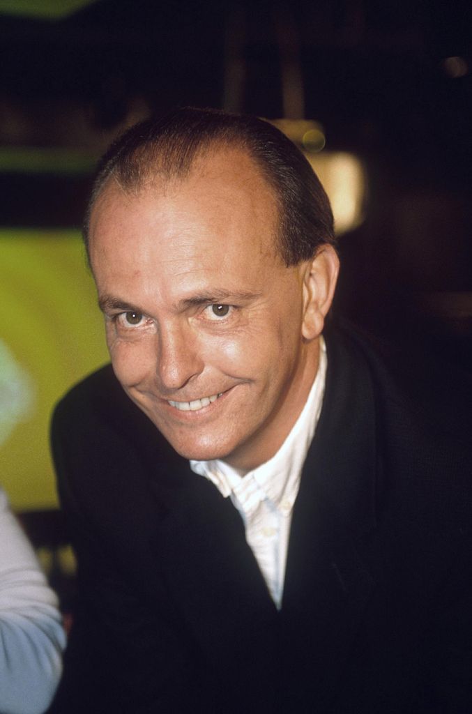 Quentin Willson bending down