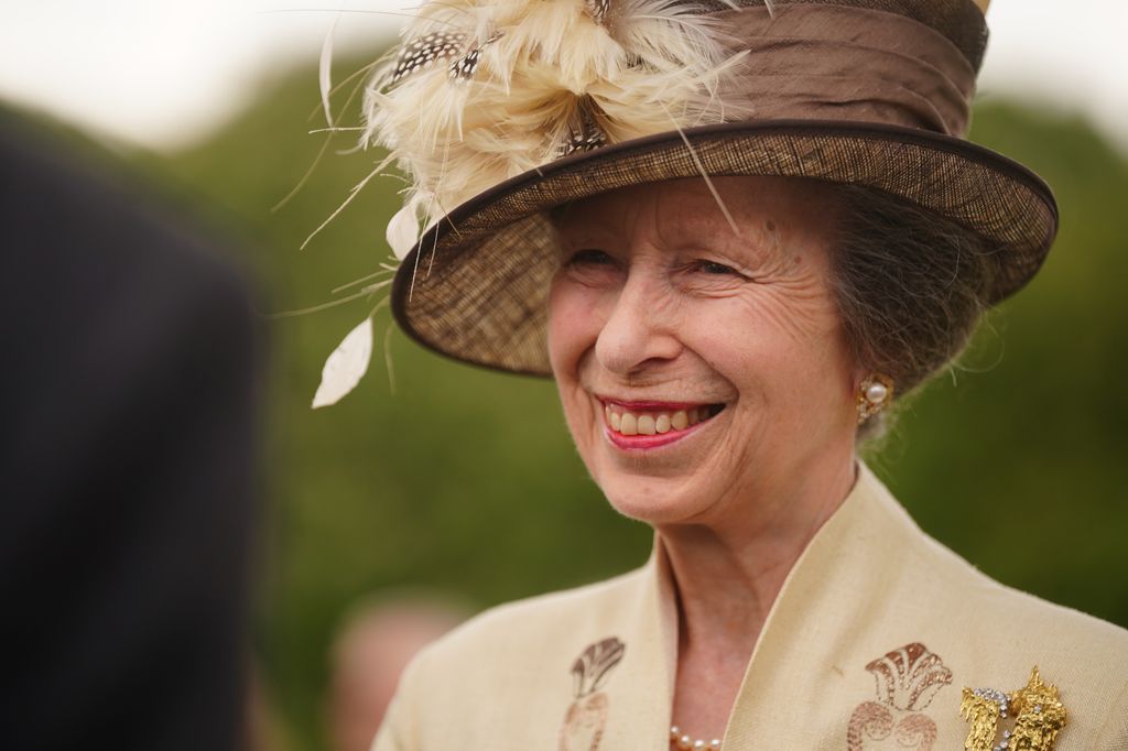 Princess Anne in a feathered hat