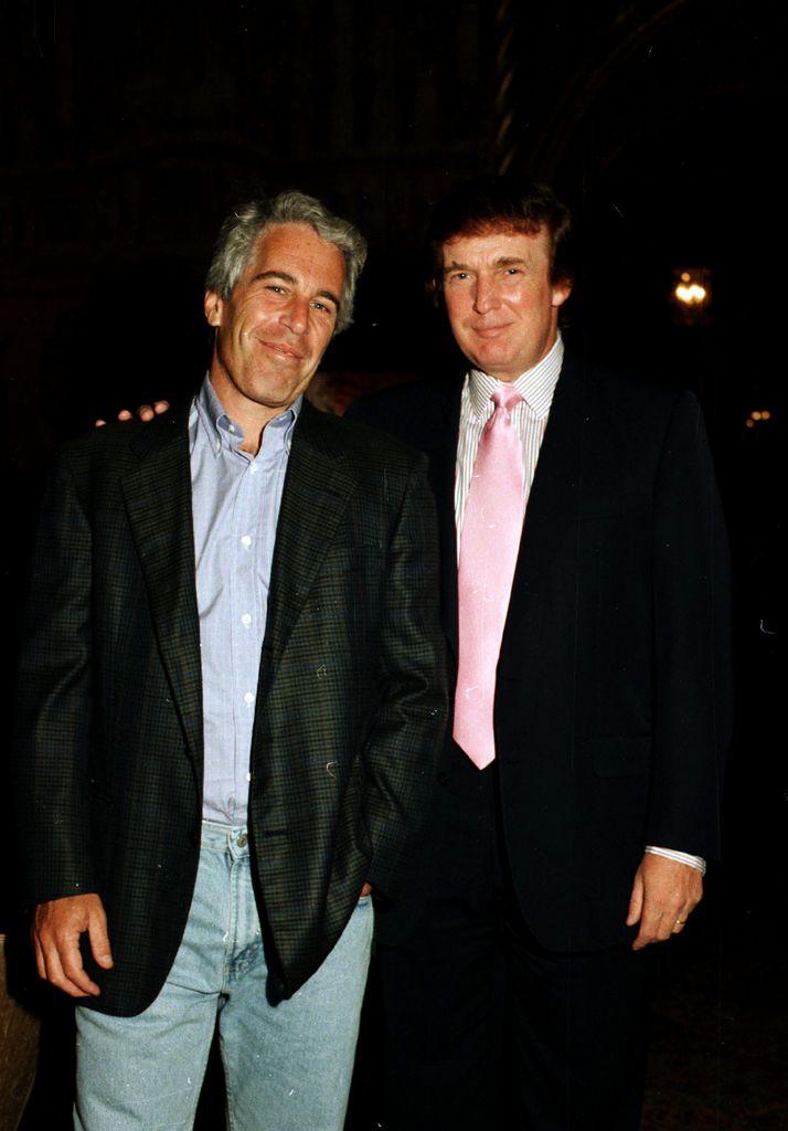 Portrait of American financier Jeffrey Epstein (left) and real estate developer Donald Trump as they pose together at the Mar-a-Lago estate, Palm Beach, Florida, 1997. (Photo by Davidoff Studios/Getty Images)