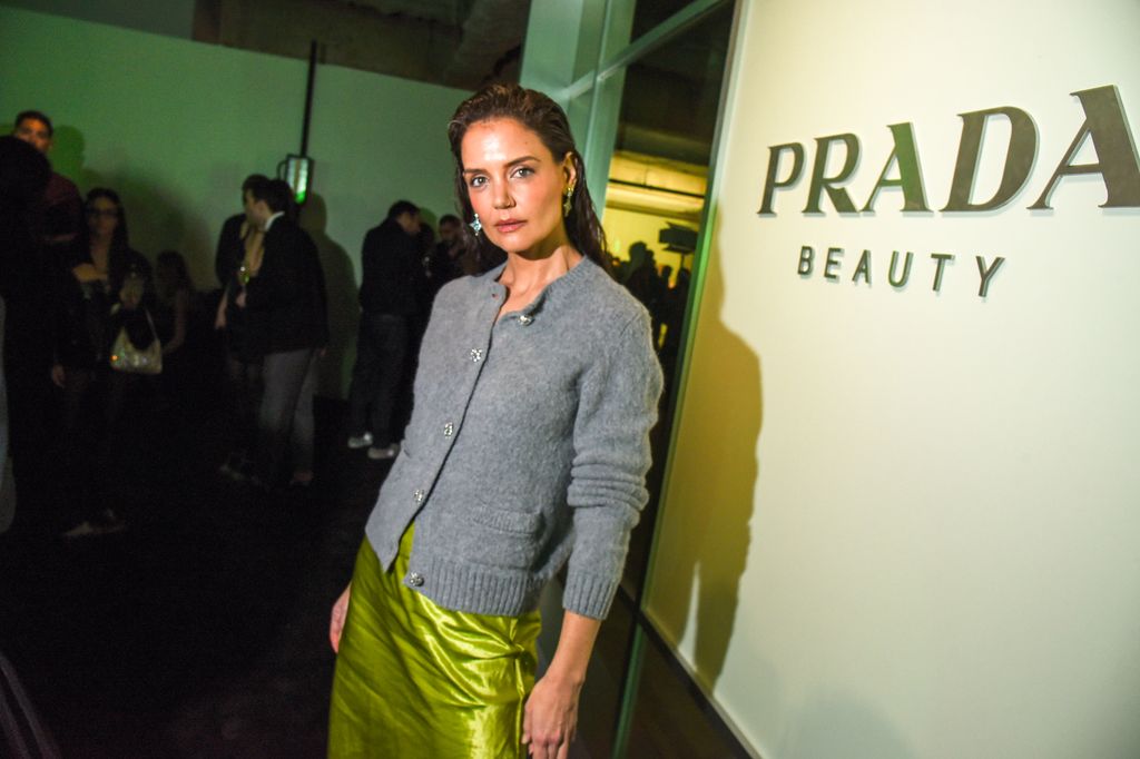 Katie Holmes at the Prada Beauty Party in grey cardigan