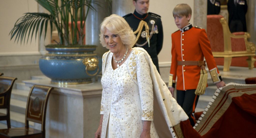 Queen Camilla with pages of honour at Buckingham Palace on coronation day