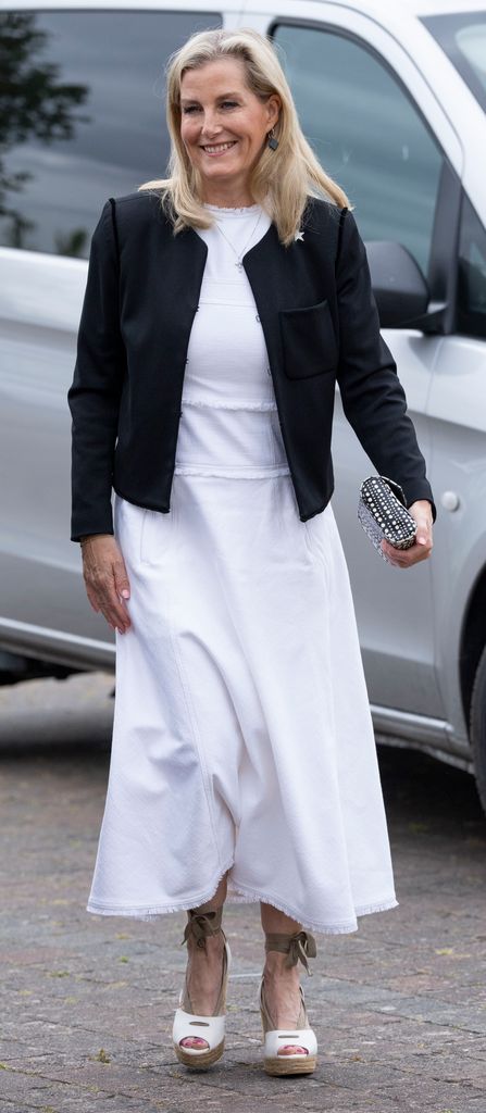 Sophie Wessex wearing a a chic white dress and black jacket