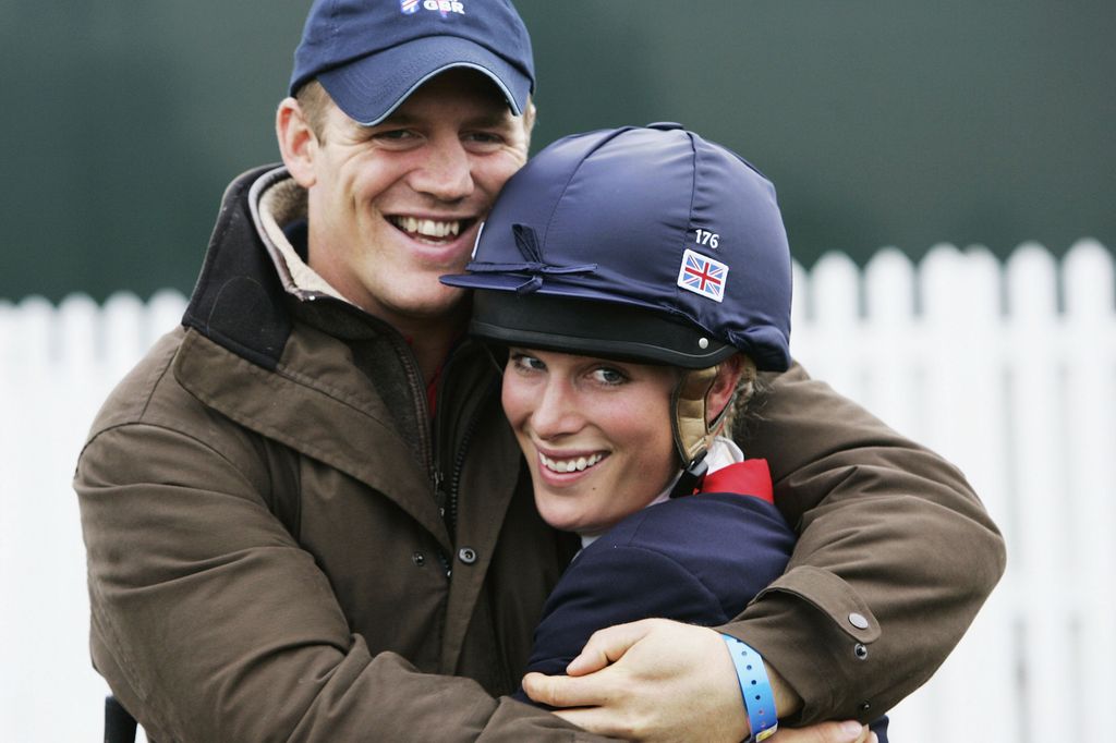 WOODSTOCK, ENGLAND - SEPTEMBER 11:  Zara Phillips gets a hug from boyfriend Mike Tindall after making a clear round to claim the European Champion title on the final day of the Blenheim FEI Petplan European Eventing Championship 2005 at Blenheim Palace on Septemer 11, 2005 near Woodstock, Oxfordshire, England. (Photo by Tim Graham Photo Library via Getty Images)