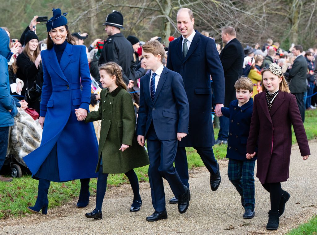 Princess Charlotte, Prince George and Prince Louis walking with Kate Middleton and Prince William