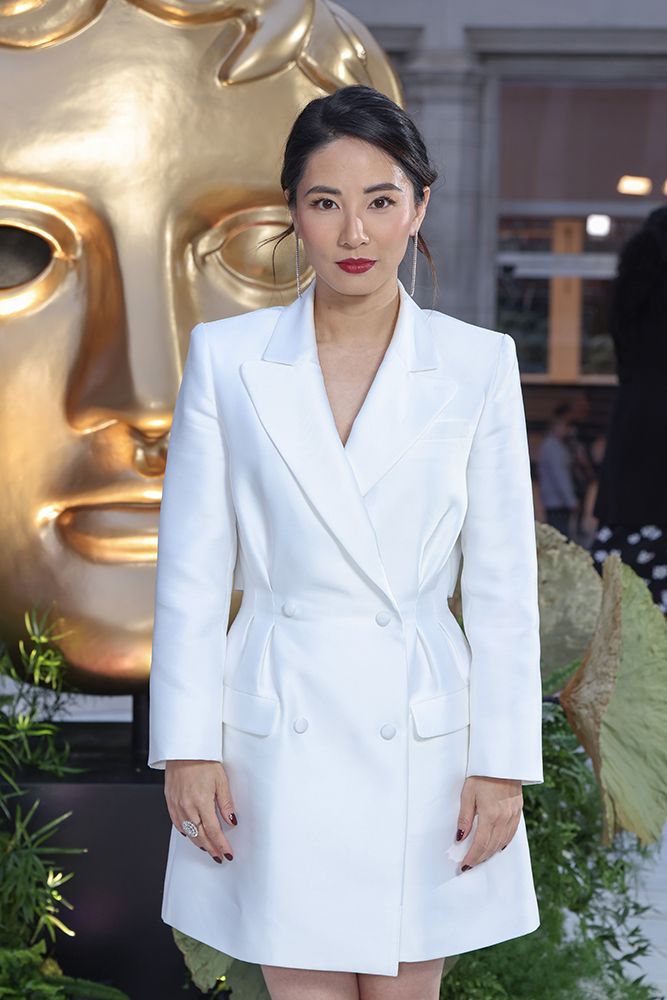 Jing Lusi wearing a white blazer dress
