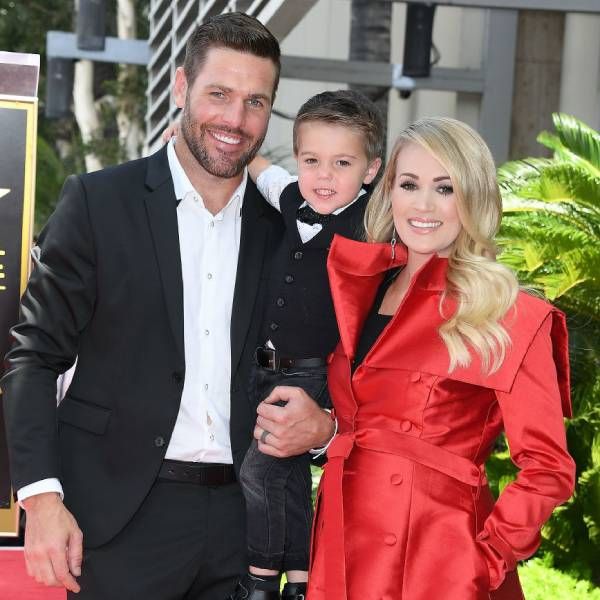 Carrie Underwood with son and husband