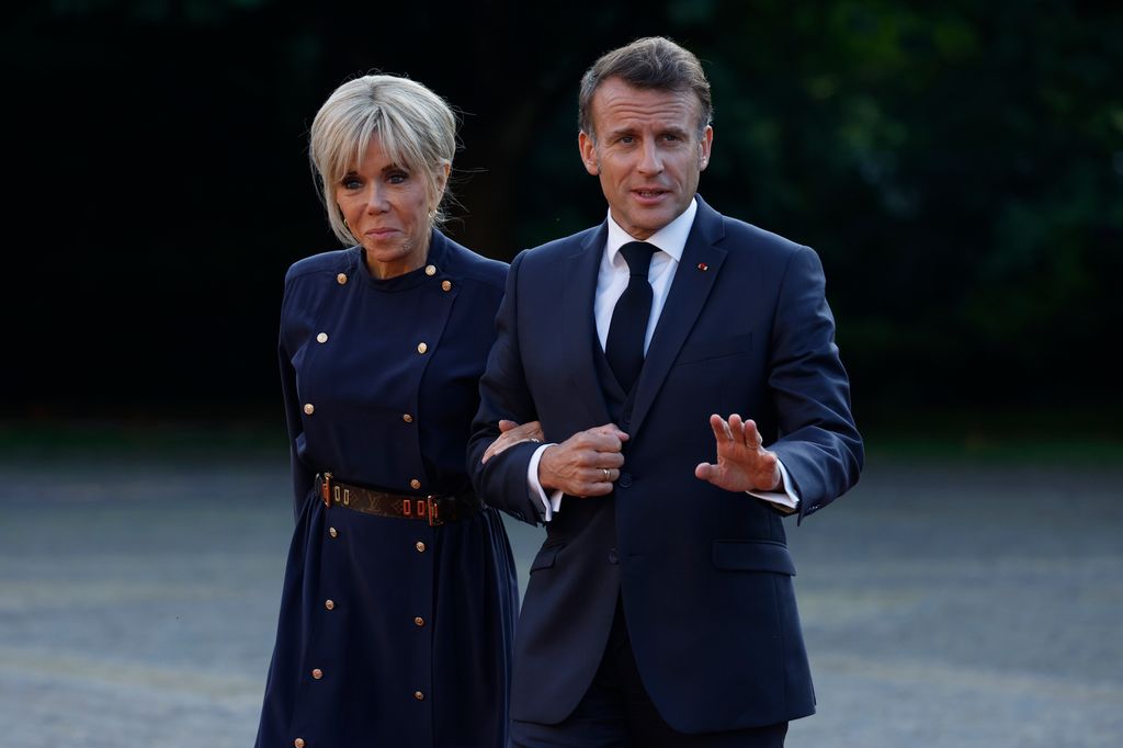 Brigitte Macron and Emmaniel Macron in blue