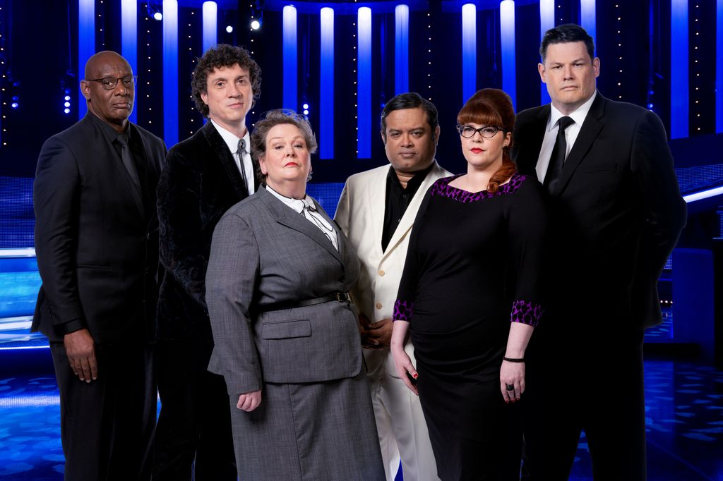 Bradley Walsh with The Chasers:  Shaun Wallace, Paul Sinha, Anne Hegerty, Jenny Ryan, Darragh Ennis and Mark Labbett