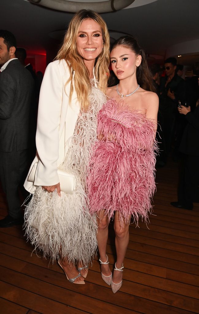 Heidi Klum and Leni in feather dresses
