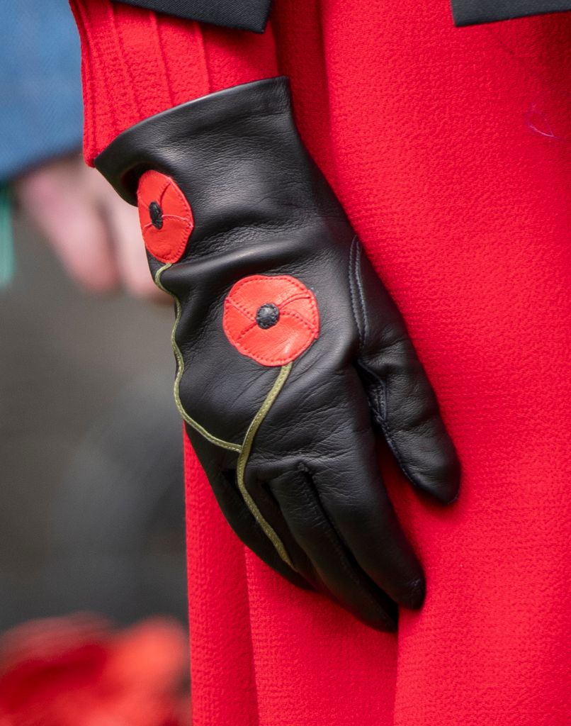 Poppy detail on Queen Camilla's gloves