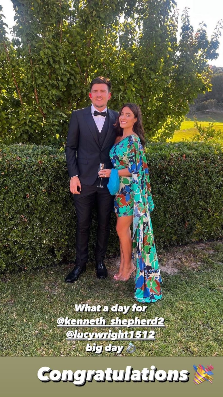 Harry Maguire in a suit and his wife Fern in a green one-shouldered dress