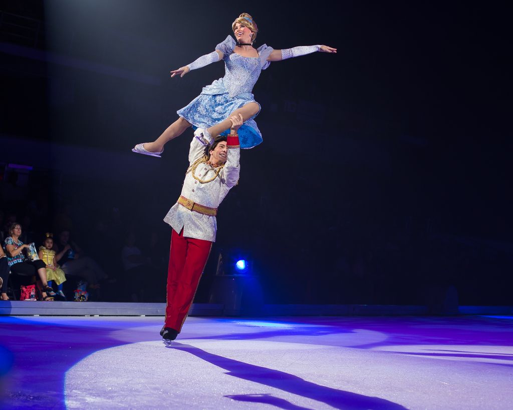 Prince Eric and Cinderella characters skating at Disney on Ice 