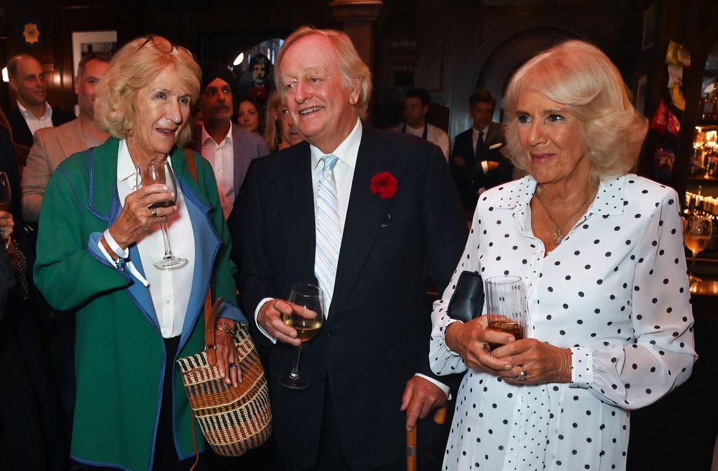 Annabel Elliot standing with Andrew Parker Bowles and Queen Camilla