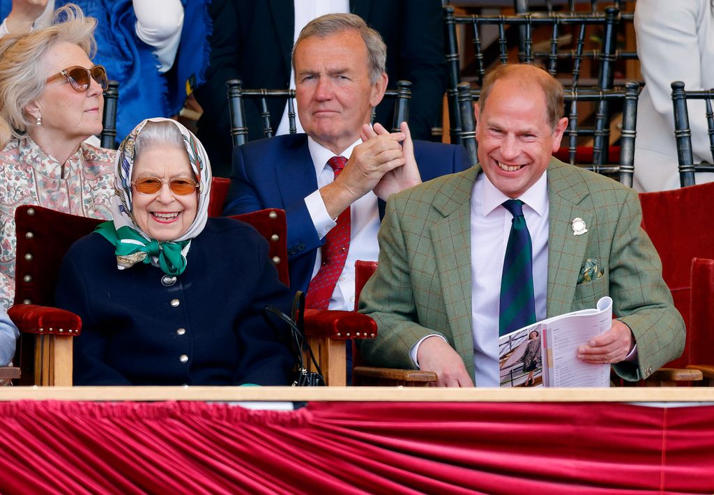 Queen Elizabeth II accompanied by Prince Edward watches her horse at the Royal Windsor Horse Show `