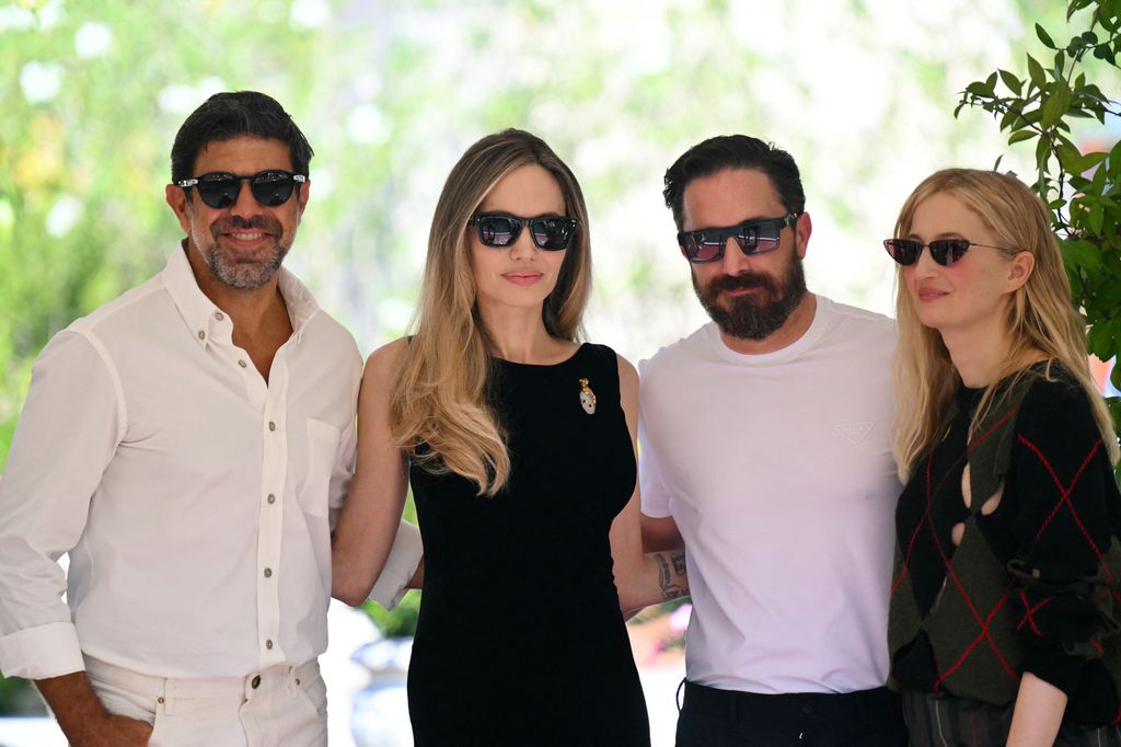 he cast of the movie "Maria" (from left) Italian actor Pierfrancesco Favino, US actress Angelina Jolie, director Pablo Larrain and Italian actress Alba Rohrwacher pose at the Excelsior pier during the 81st Venice International Film Festival at Venice Lido, on August 29, 2024 . The movie 'Maria', a biopic directed by Pablo Larrain on famous singer Maria Callas with Angelina Jolie, is presented today in competion at Venice Film Festival.