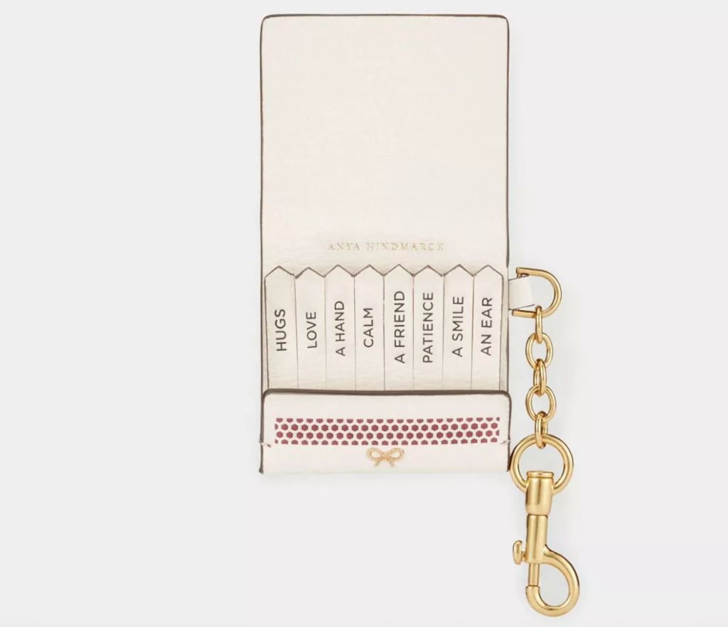 Meghan Markle was spotted wearing the $310 leather matchbook keychain by British designer Anya Hindmarch