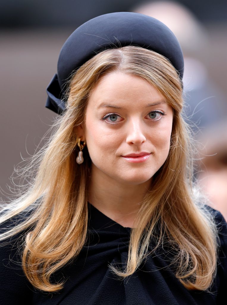 Flora Vesterberg in a black hat with her hair down