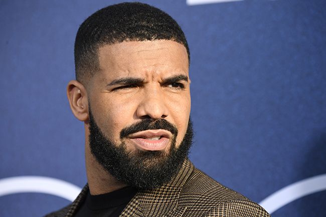 Drake faces photographers at event