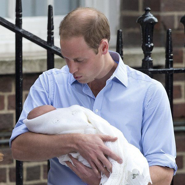 prince william looks at newborn prince george
