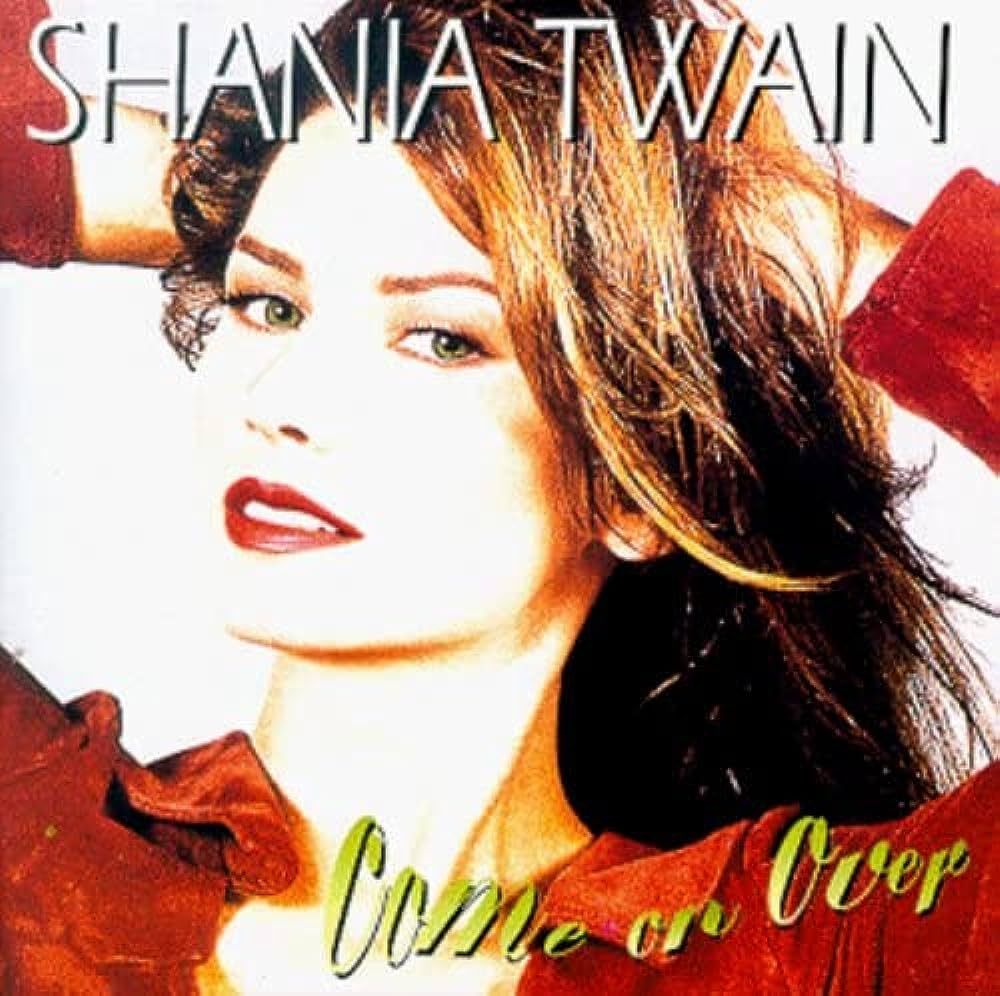 Album cover for Shania Twain's Come On Over; it features Shania with her hands behind her head