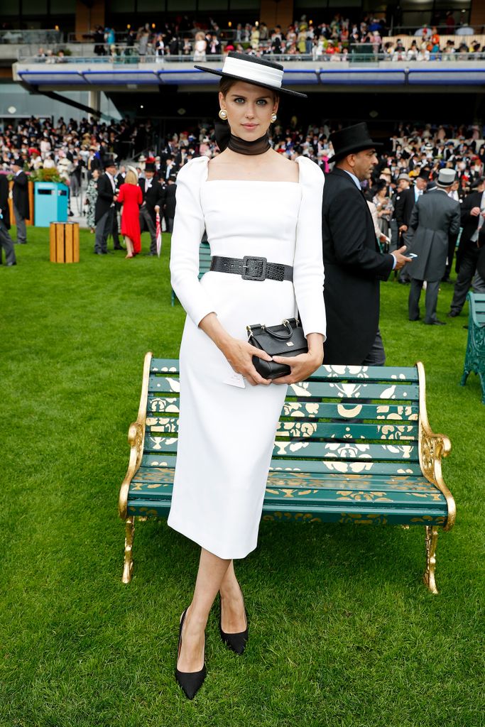 ASCOT, ENGLAND - JUNE 19: Sabrina Percy on day 2 of Royal Ascot at Ascot Racecourse on June 19, 2019 in Ascot, England. They were commissioned by Ascot Racecourse to paint benches to be positioned by the track in the Royal Enclosure. Each girl interpreted